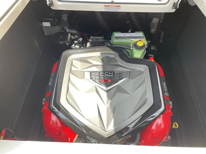 Slide: The Image of 2026 Nautique G23 engine compartment with PCM engine cover. - 33