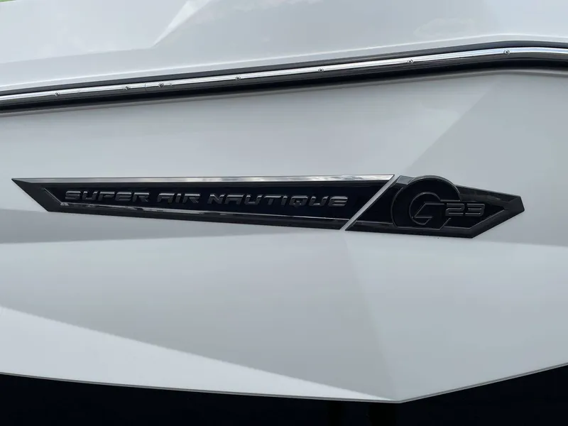 Slide: The Image of 2026 Nautique G23 boat logo on white background. - 34