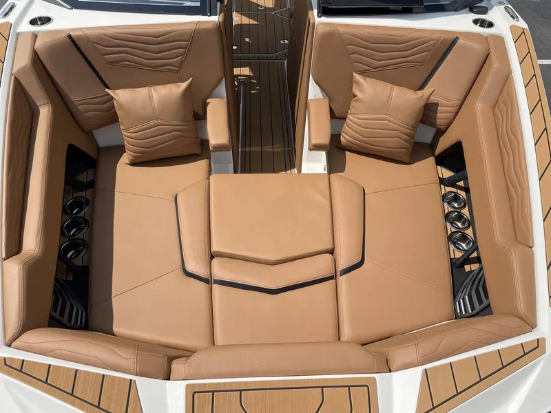 Slide: The Image of Luxurious interior of 2026 Nautique G23 with beige leather seating. - 47