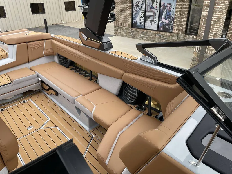Slide: The Image of Interior of 2026 Nautique G25 with luxurious leather seating. - 12