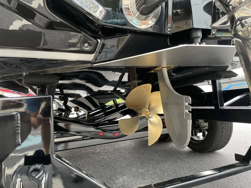 Slide: The Image of Underside of a 2026 Nautique G25 boat with propeller. - 14