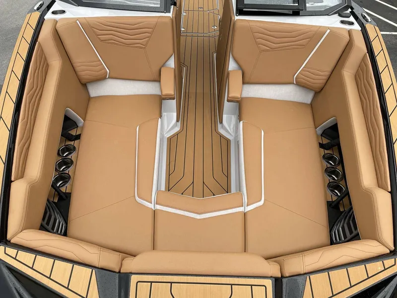 Slide: The Image of Interior of 2026 Nautique G25 with luxurious leather seating. - 30