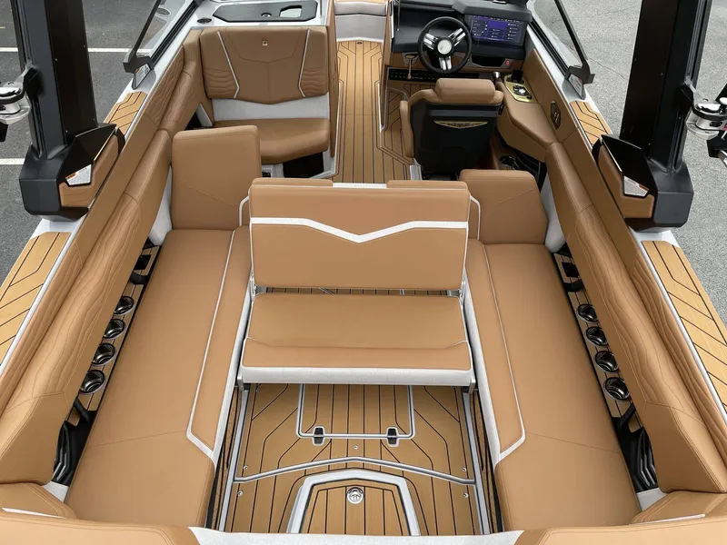 Slide: The Image of Interior of 2026 Nautique G25 with luxurious leather seating. - 31