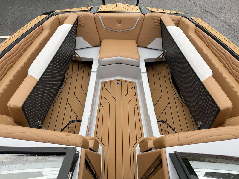 Slide: The Image of 2026 Nautique G25 interior with luxurious seating. - 35