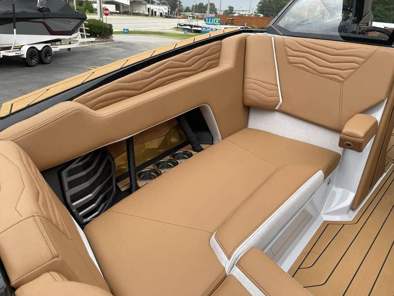 Slide: The Image of Interior of 2026 Nautique G25 with luxurious leather seating. - 6