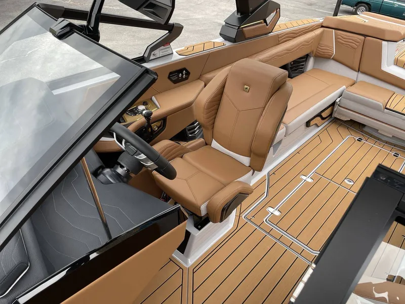 Slide: The Image of 2026 Nautique G25 interior with luxurious leather seating. - 7