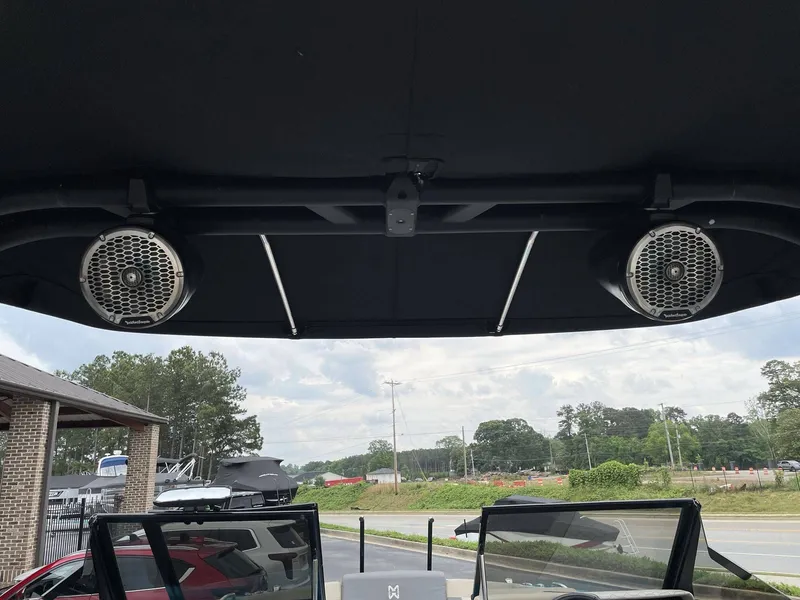 Slide: The Image of HEYDAY WAKE BOATS H22 2022 with speakers under black canopy. - 17