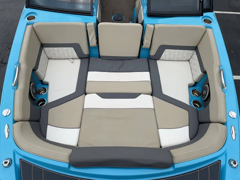 Slide: The Image of Interior of a 2022 HEYDAY WAKE BOATS H22 with blue accents. - 18