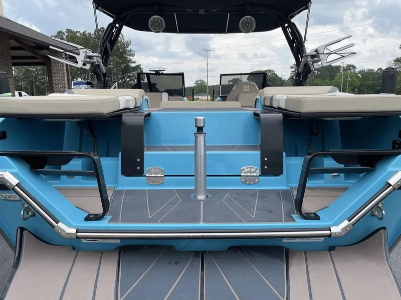 Slide: The Image of Rear view of 2022 HEYDAY WAKE BOATS H22 with blue finish. - 19