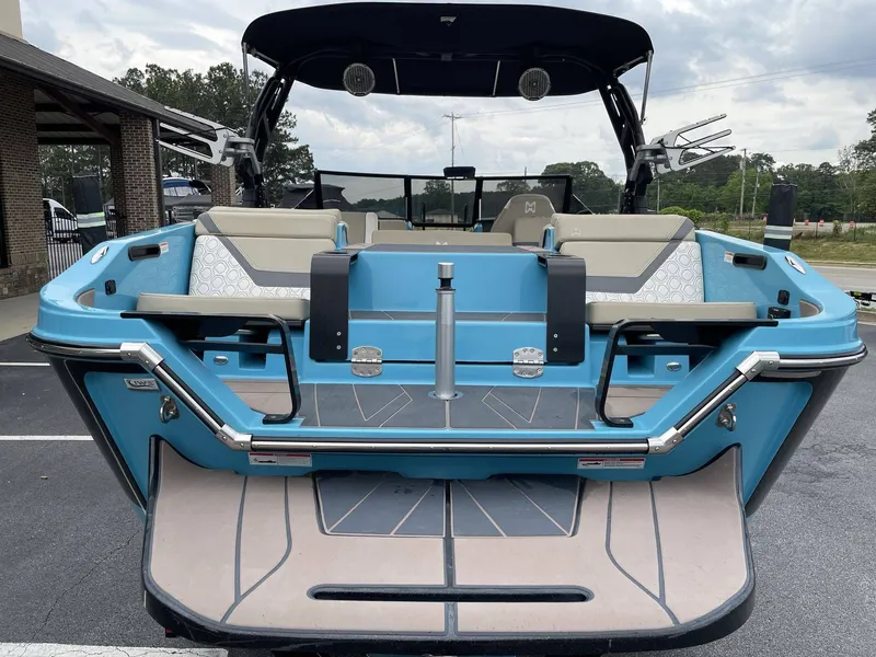 Slide: The Image of Rear view of a 2022 HEYDAY WAKE BOATS H22 in blue. - 20