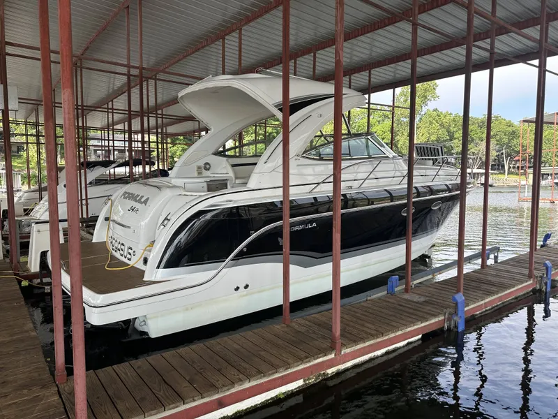 The Image of 2012 Formula 34 Performance Cruiser docked in marina. - 1