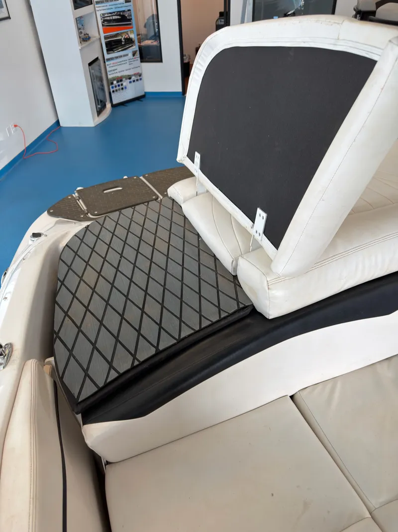 Slide: The Image of Interior of a 2008 Four Winns H210 boat with seat cushion. - 13