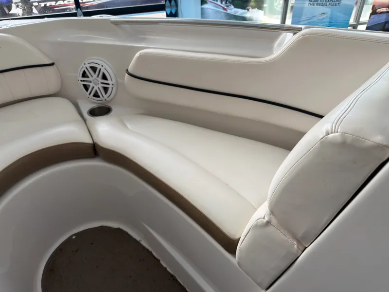 Slide: The Image of Interior of a 2008 Four Winns H210 boat with white seating. - 14