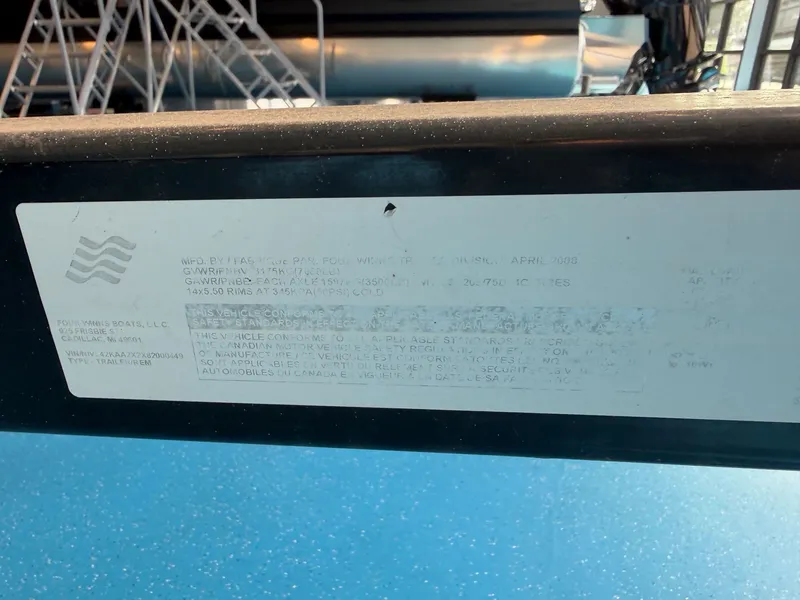 Slide: The Image of Label on a 2008 Four Winns H210 boat trailer. - 17