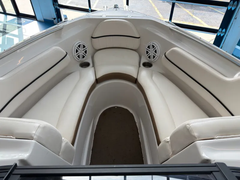 Slide: The Image of Interior of 2008 Four Winns H210 boat with white seating. - 7