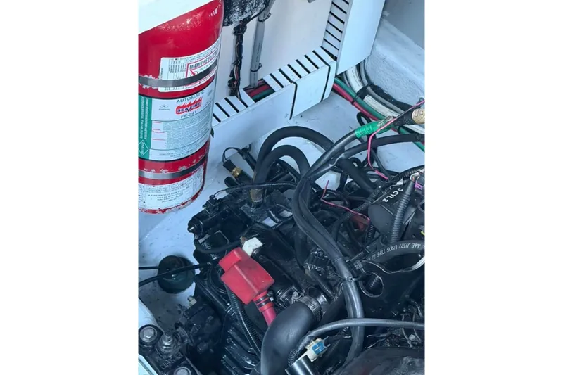 Slide: The Image of Engine compartment of a 2008 Sea Ray 380 Sundancer with fire extinguisher. - 16