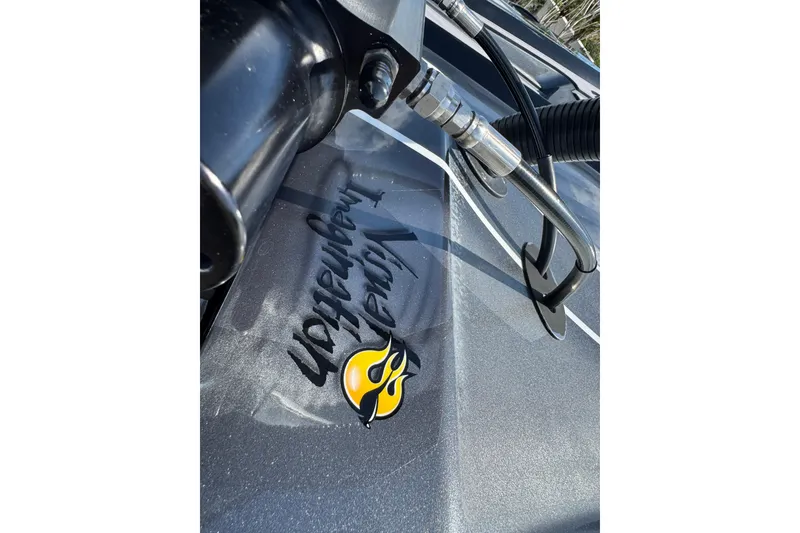 Slide: The Image of Close-up of MTI 390X boat with "Visual Imagination" logo, 2023 model. - 24