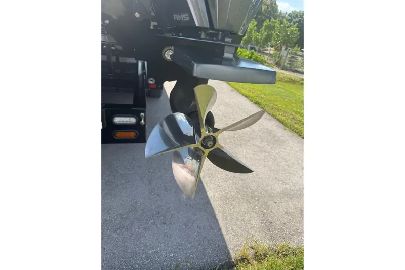 Slide: The Image of Close-up of a 2023 MTI 390X boat propeller on a sunny day. - 25