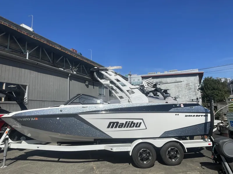 The Image of 2019 Malibu Wakesetter 23 LSV boat on trailer, side view. - 1