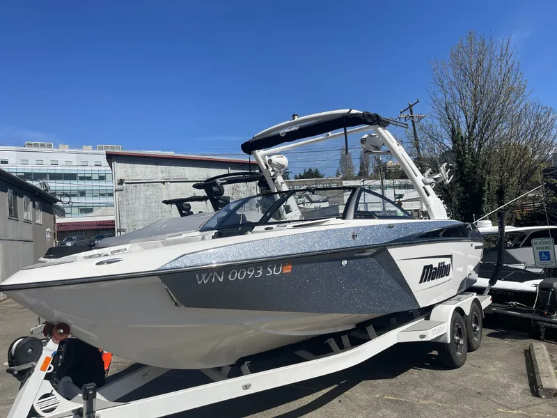 Slide: The Image of 2019 Malibu Wakesetter 23 LSV on trailer, sunny day. - 2