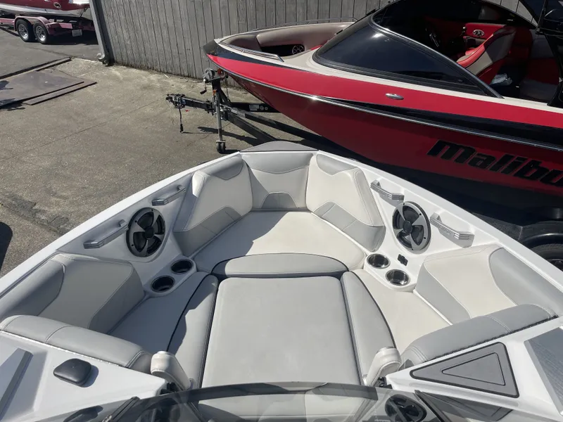 Slide: The Image of Interior of a 2019 Malibu Wakesetter 23 LSV boat with gray seating. - 8