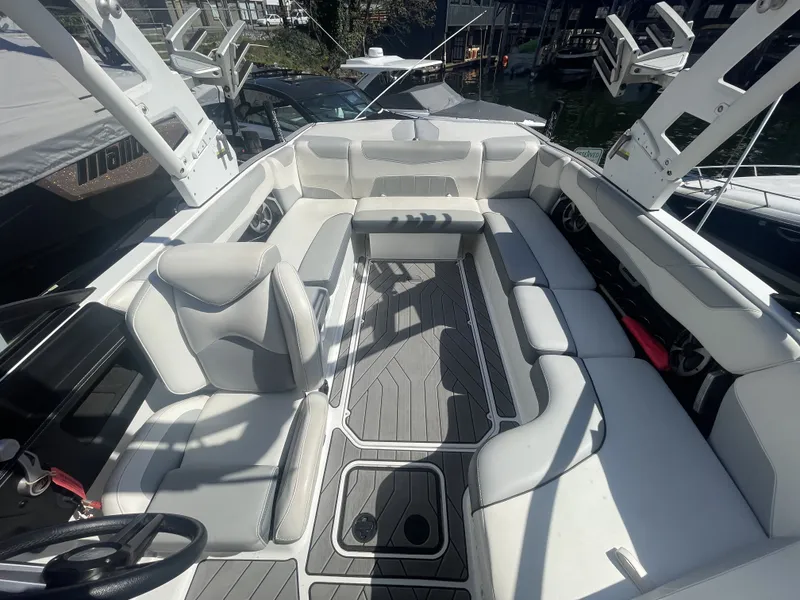 Slide: The Image of Interior of a 2019 Malibu Wakesetter 23 LSV boat with gray seating. - 9
