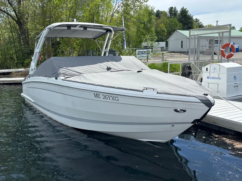 Slide: The Image of 2025 Cobalt R4 boat docked with cover on. - 3