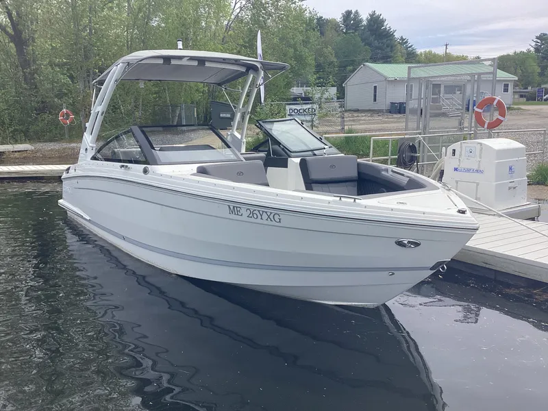 The Image of Cobalt R4 2025 boat docked, sleek white design. - 4