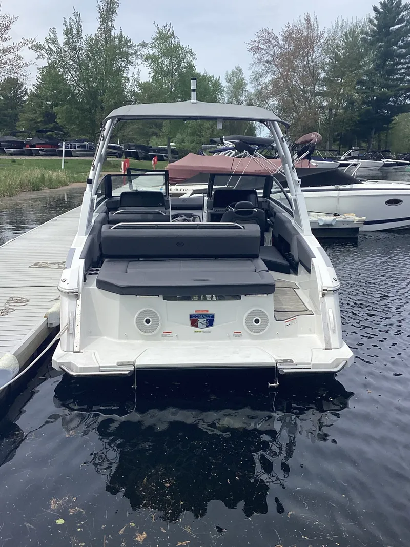 Slide: The Image of 2025 Cobalt R4 boat at dock, rear view. - 6