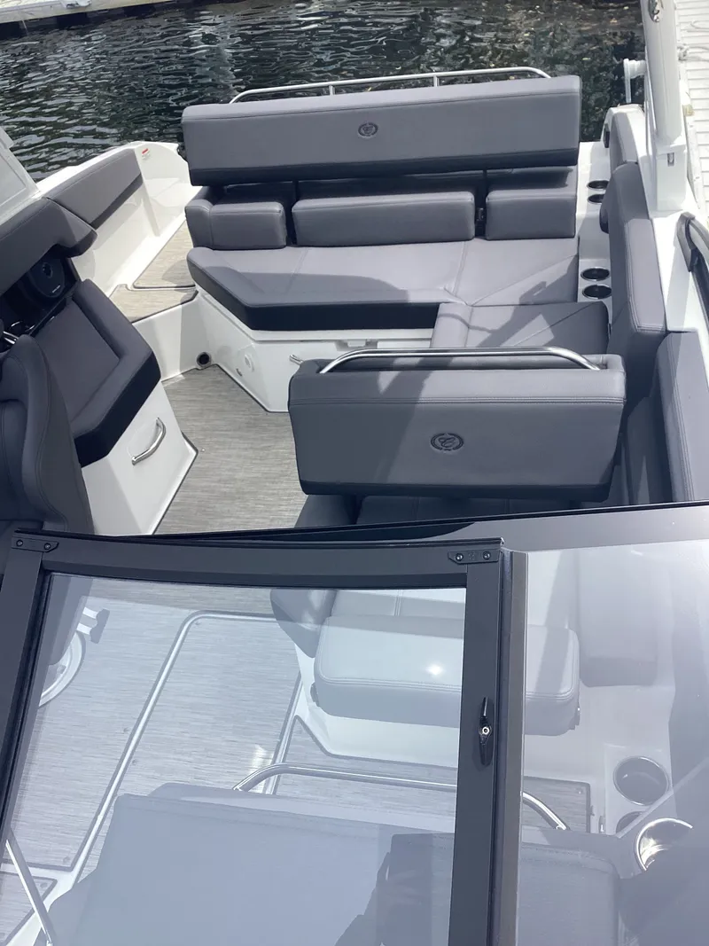 Slide: The Image of Interior of 2025 Cobalt R4 boat with gray seating. - 9