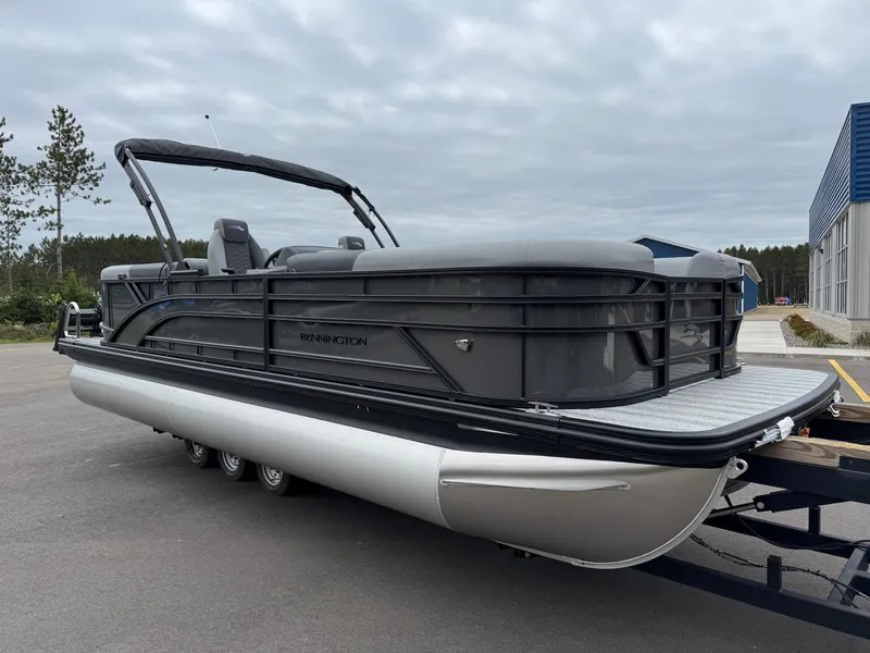 Slide: The Image of 2026 Bennington 23SSR SPS LTD TRI pontoon boat on trailer. - 18