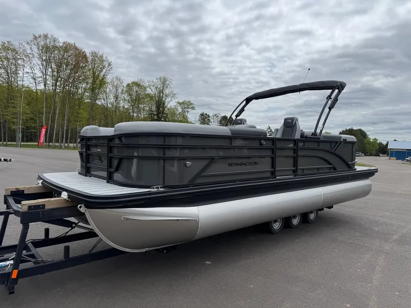 Slide: The Image of 2026 Bennington 23SSR SPS LTD TRI pontoon boat on trailer. - 19