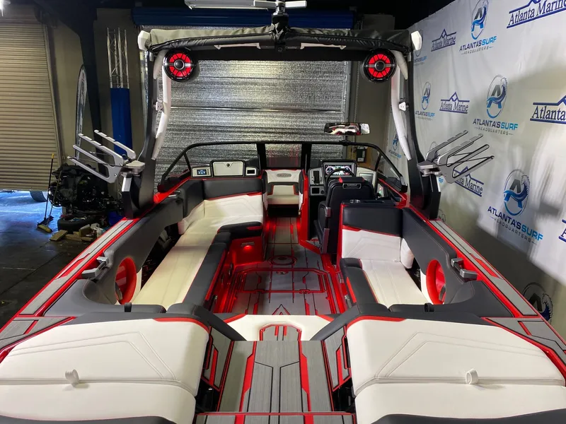 Slide: The Image of Interior view of a 2021 Supra SL 400 boat with modern seating. - 10