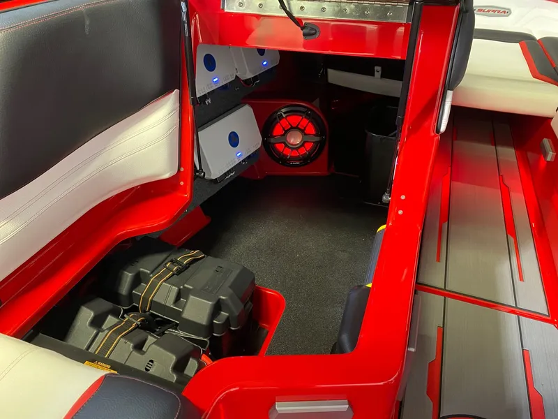 Slide: The Image of Interior of 2021 Supra SL 400 boat featuring sound system. - 19