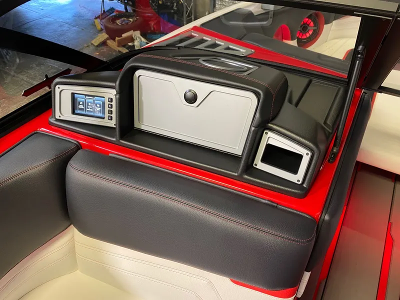 Slide: The Image of Interior of 2021 Supra SL 400 boat with modern dashboard. - 20