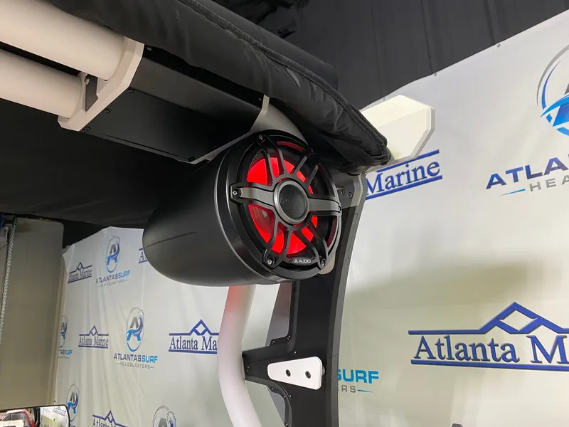 Slide: The Image of Red speaker on a 2021 Supra SL 400 boat. - 23