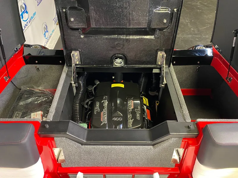 Slide: The Image of Engine compartment of a 2021 Supra SL 400 boat, open. - 25