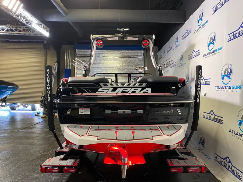 Slide: The Image of 2021 Supra SL 400 boat in showroom at Atlanta Marine. - 5