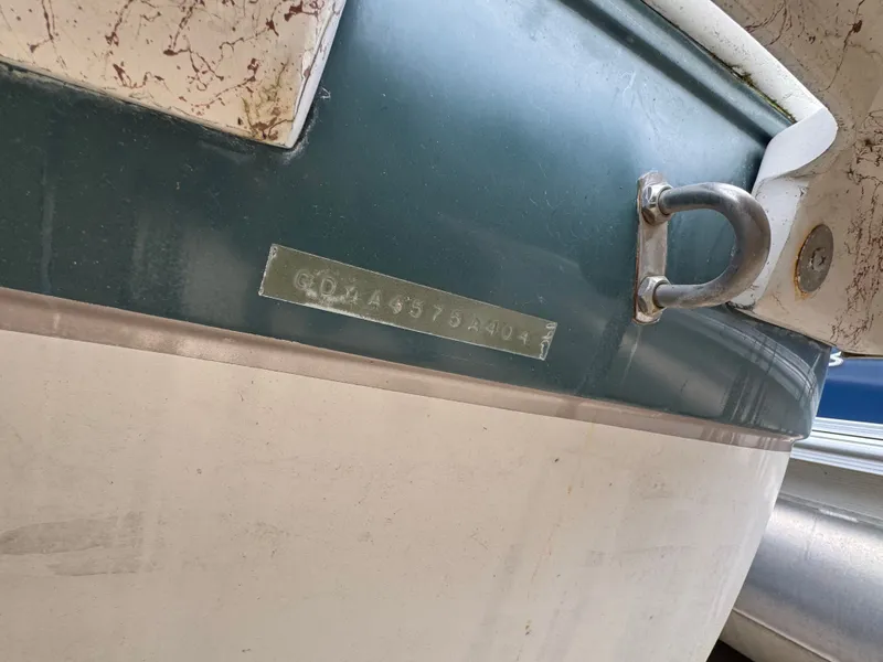 Slide: The Image of 2004 Hurricane SD187 boat with visible serial number. - 13