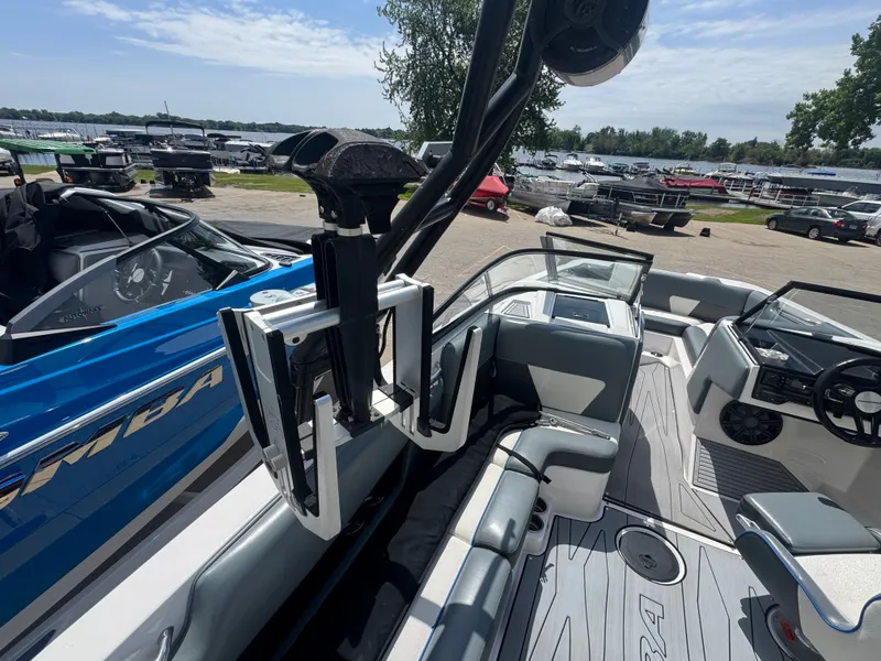 Slide: The Image of Interior of a 2018 Moomba Max boat by the lakeside. - 15