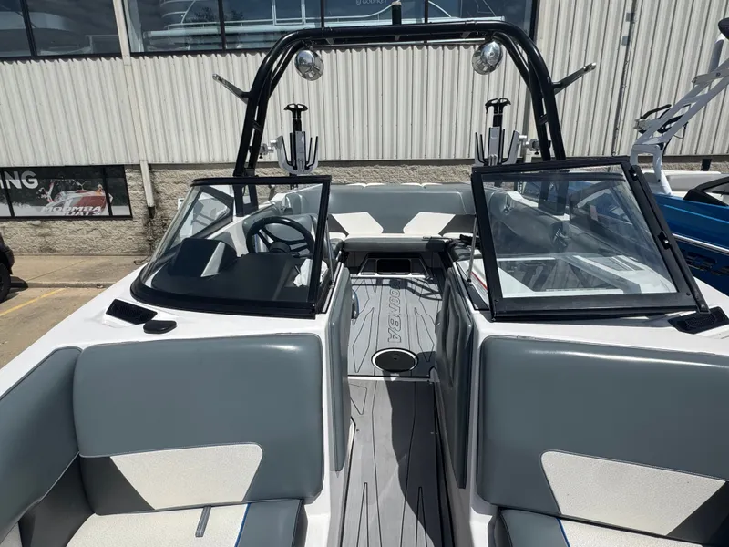 Slide: The Image of 2018 Moomba Max boat interior with gray seating. - 4
