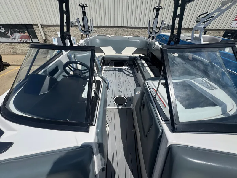 Slide: The Image of Interior view of a 2018 Moomba Max boat with gray seating. - 5