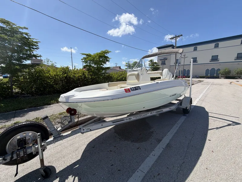 The Image of 2019 Stingray 186 boat on trailer in sunny weather. - 1