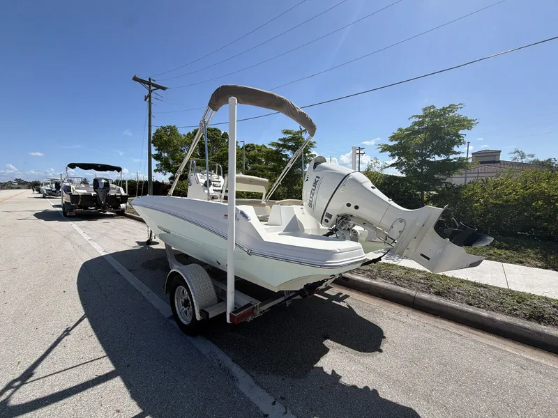Slide: The Image of 2019 Stingray 186 boat on trailer, sunny day. - 14