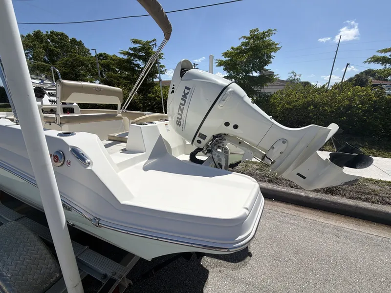 Slide: The Image of 2019 Stingray 186 boat with Suzuki outboard motor. - 15