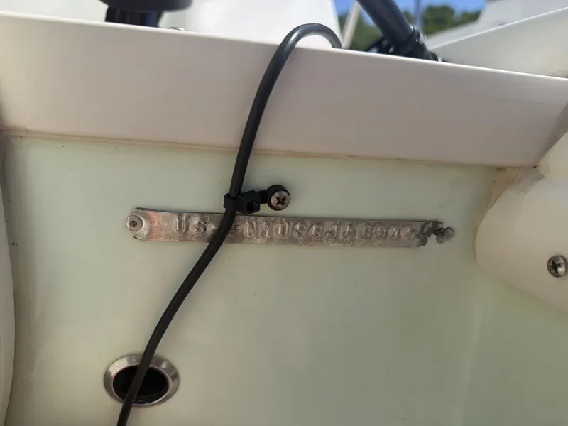 Slide: The Image of Close-up of a 2019 Stingray 186 boat with serial number. - 18