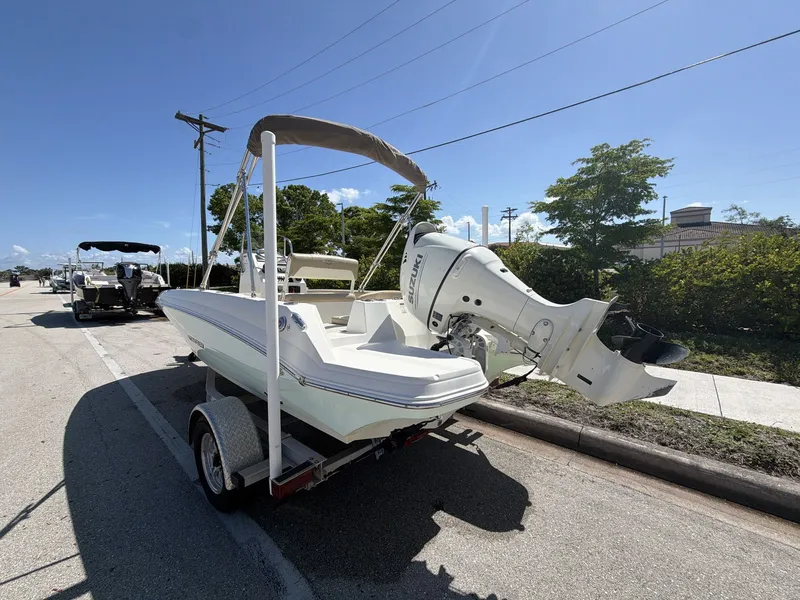 Slide: The Image of 2019 Stingray 186 boat on trailer in sunny weather. - 8