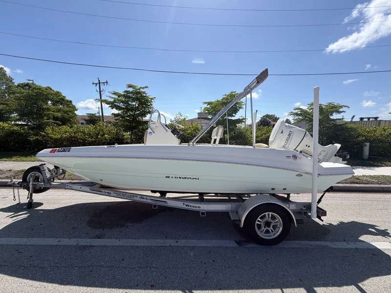 Slide: The Image of 2019 Stingray 186 boat on trailer in sunny weather. - 9