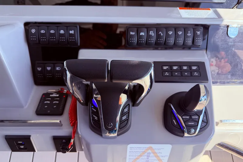 Slide: The Image of Control panel of 2023 Jeanneau Leader 12.5 WA boat with advanced navigation features. - 15