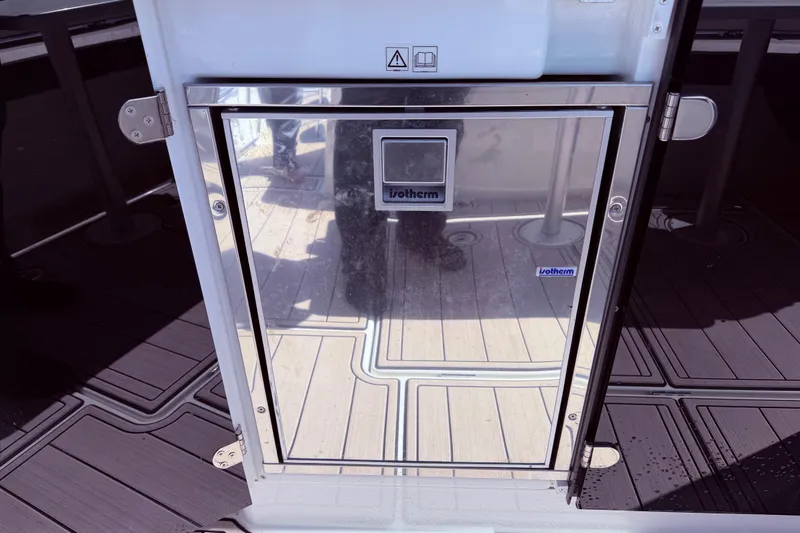Slide: The Image of 2023 Jeanneau Leader 12.5 WA boat interior with Isotherm fridge door. - 20